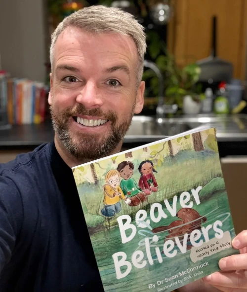 Sean_holding_book